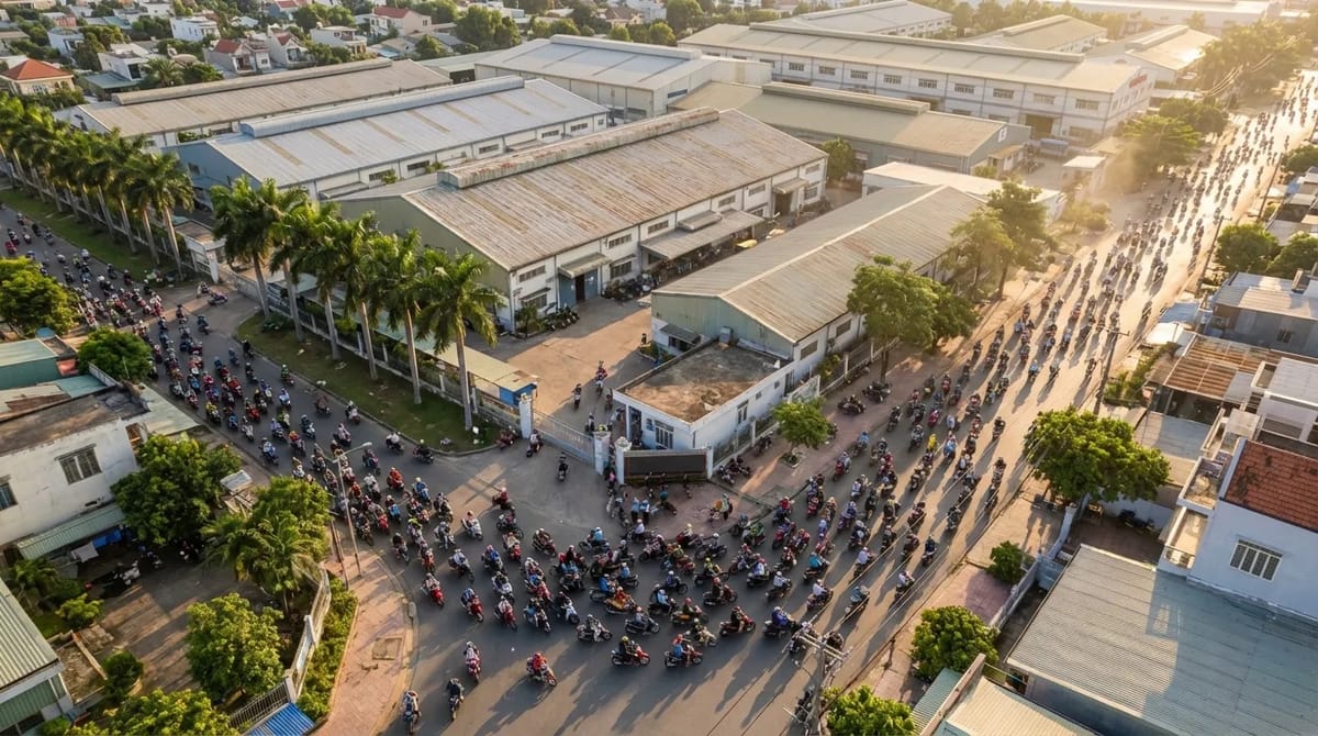 Aerial view of motorbike rush hour in a Vietnamese industrial zone